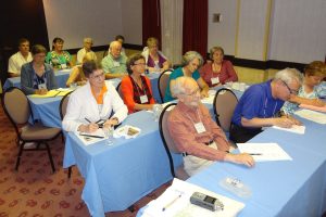Attendees from around the country learn how to publish and publicize funeral price surveys.